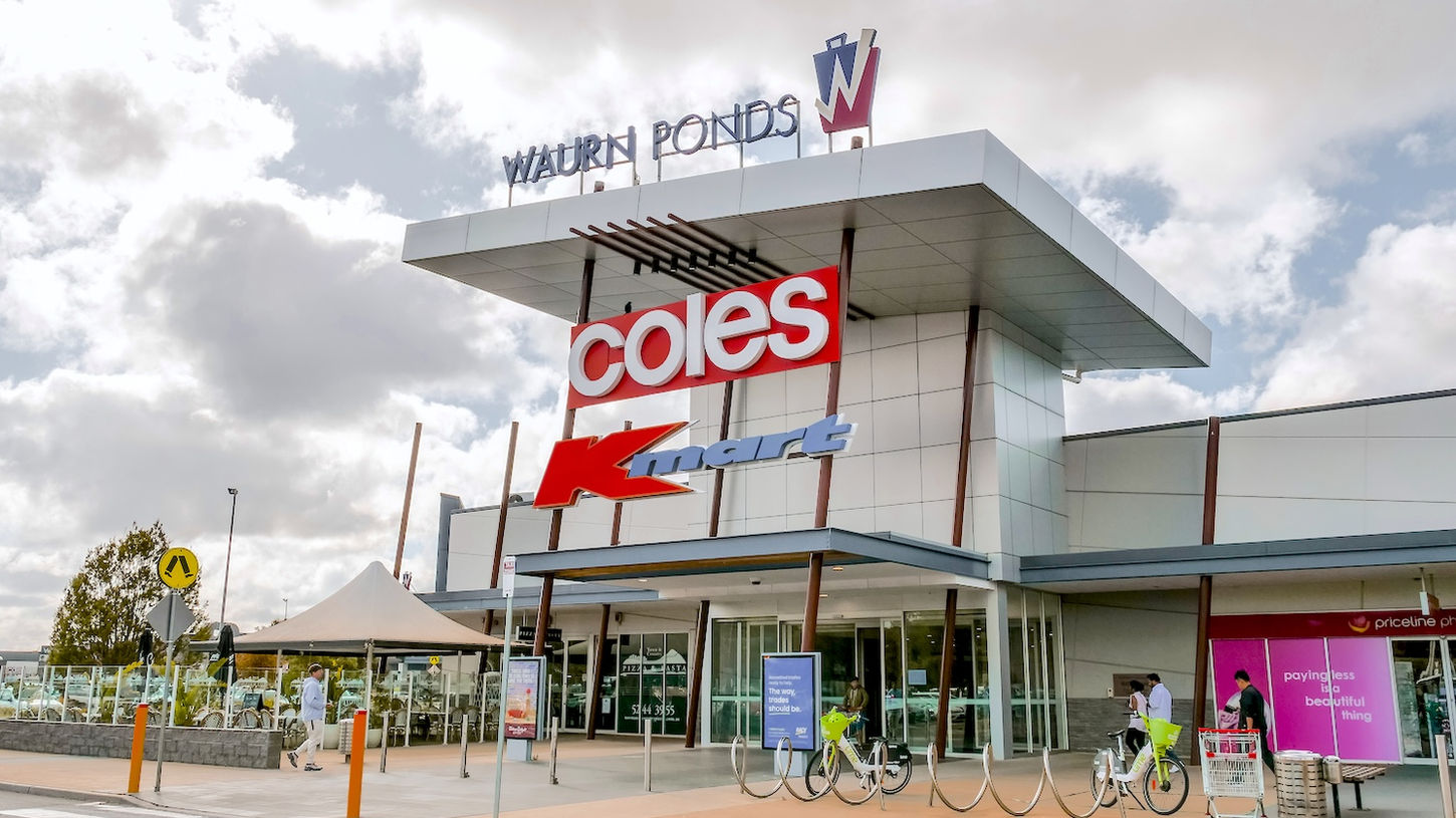 Waurn Ponds shopping centre exterior featuring a Coles supermarket with car park